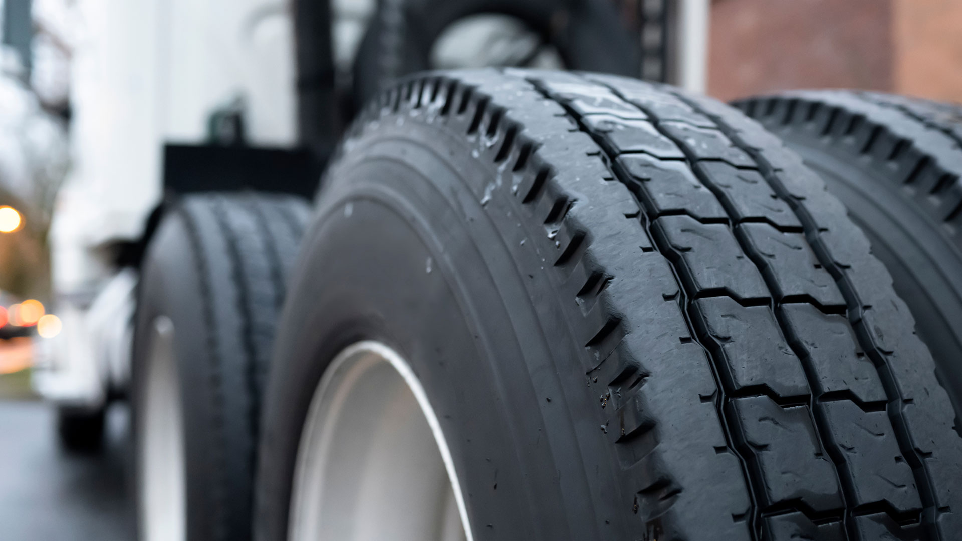 Closeup shot of the front tires of a semi truck